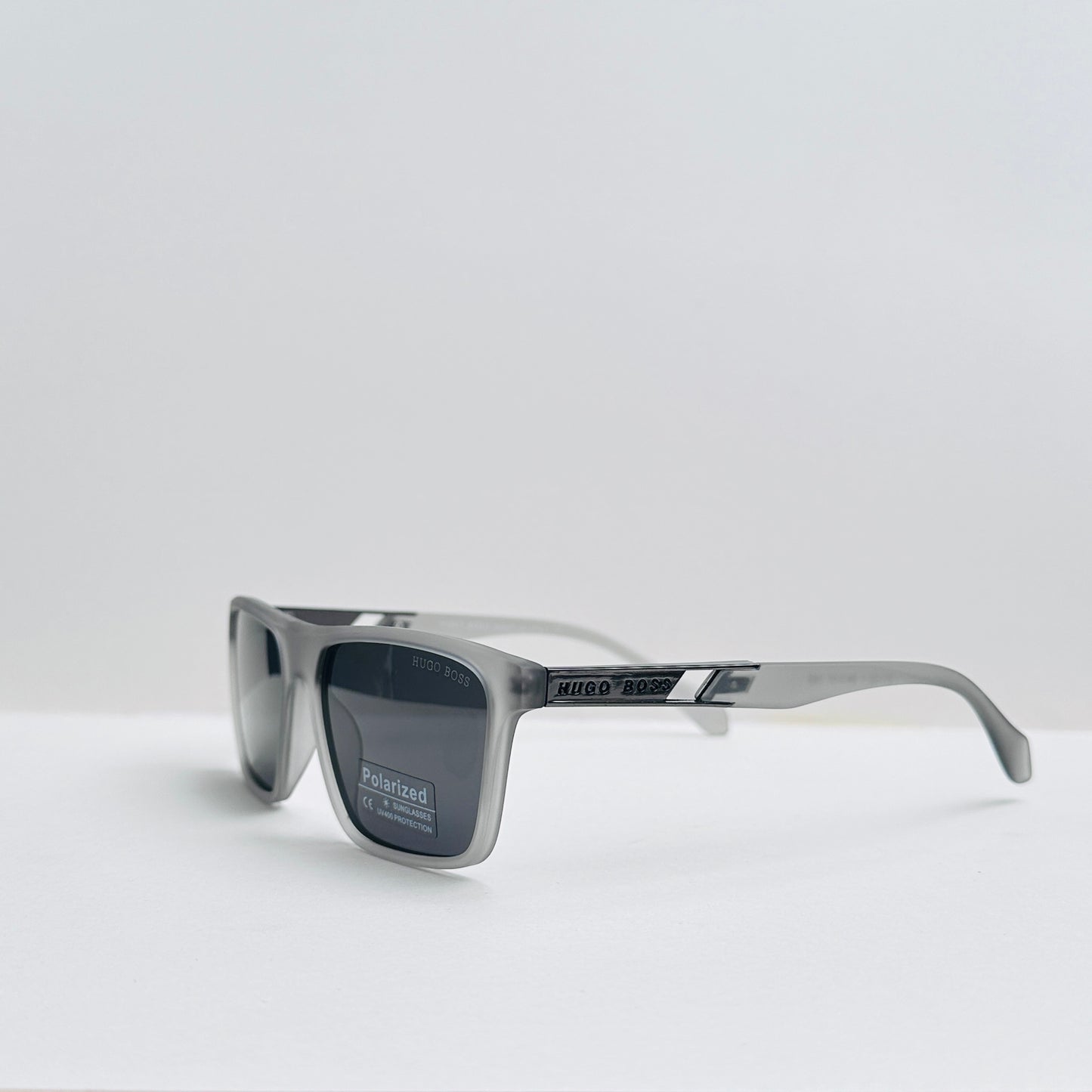 Hugo Boss Matte Transparent Grey Wafer Sunglasses with Polarized Black Lenses
