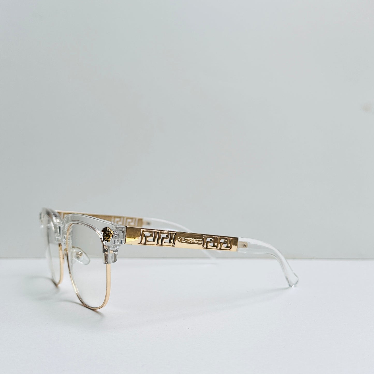 Versace White Transparent Glasses with Golden Crafted Temples