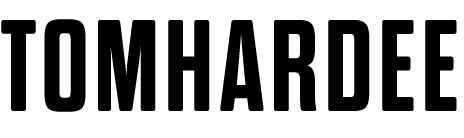 Black text 'TOMHARDEE' on a white background