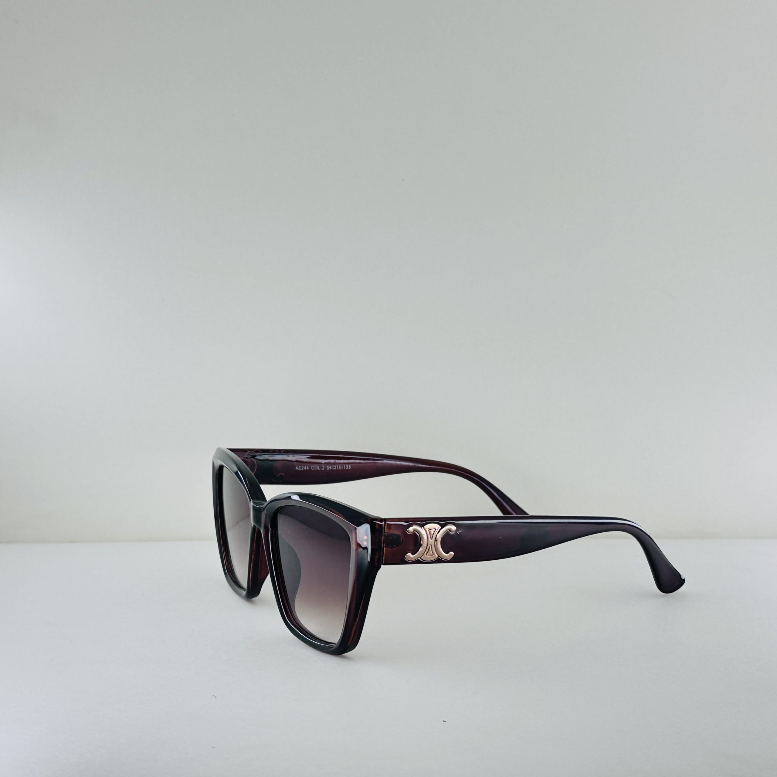 Celine Triomphe – Burgundy Tortoise Geometric Cat-Eye Sunglasses - Image 2