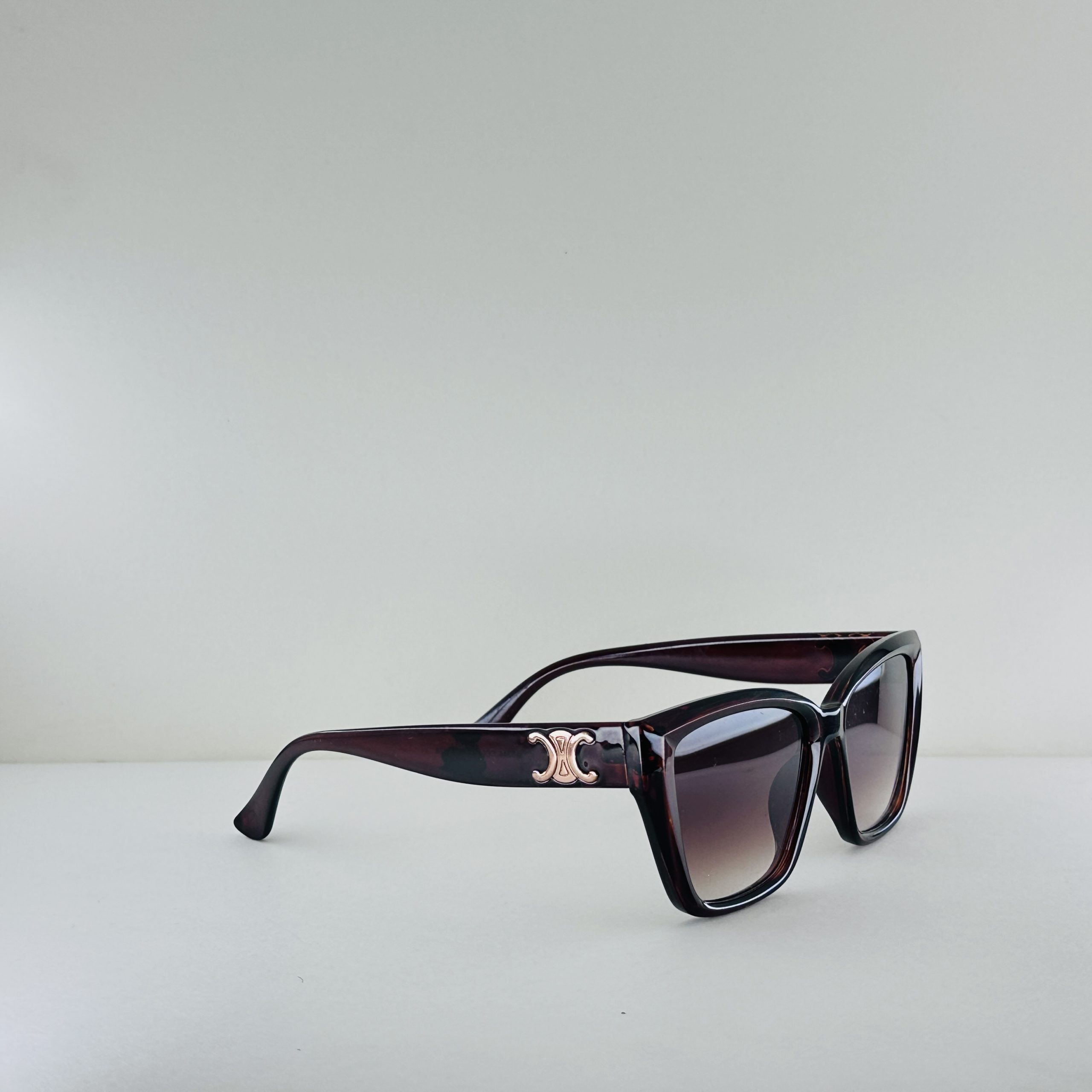 Celine Triomphe – Burgundy Tortoise Geometric Cat-Eye Sunglasses - Image 3